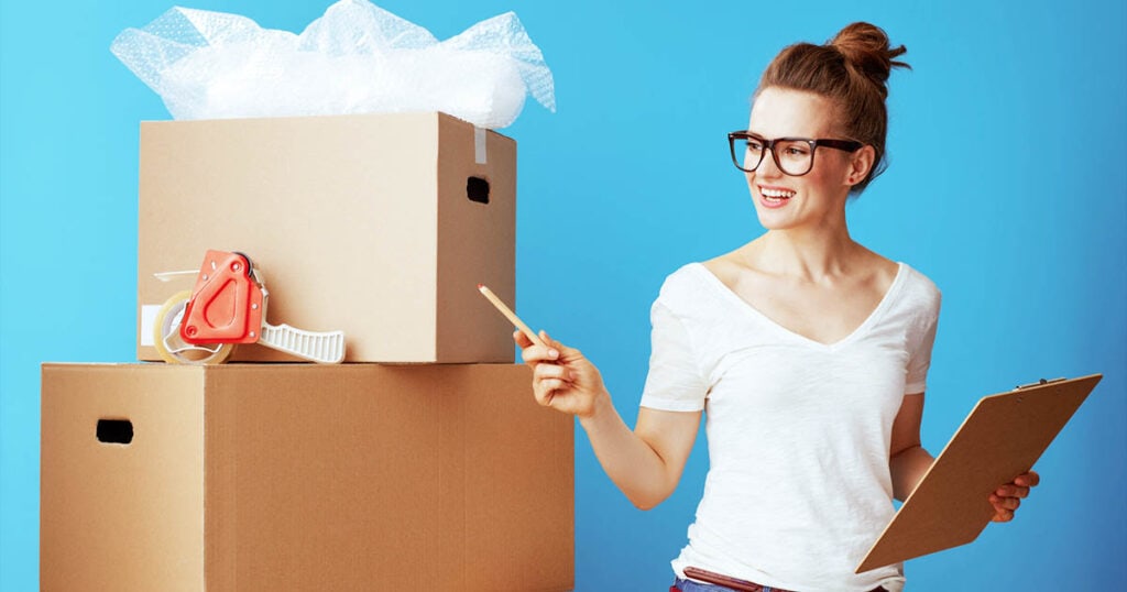 woman looking at packaged boxes