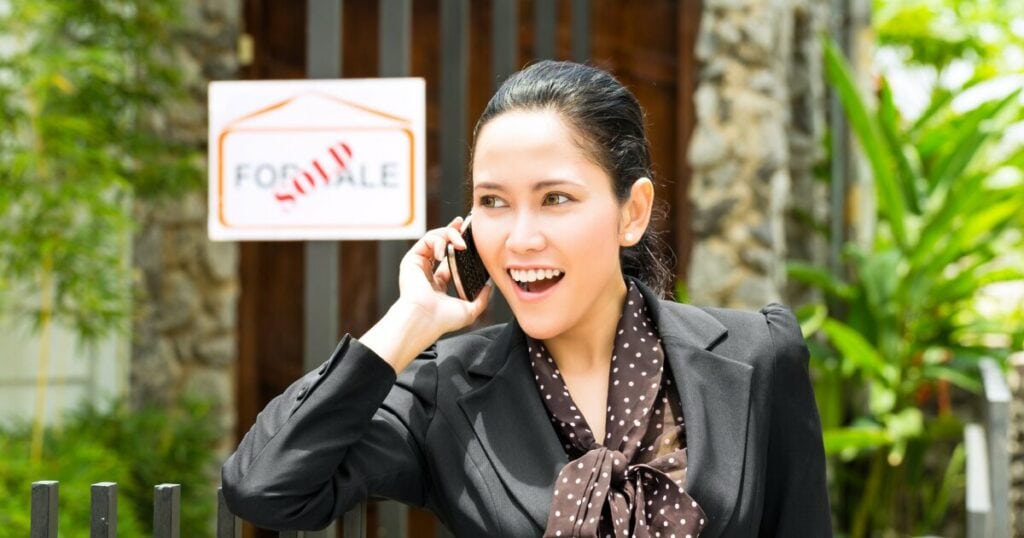 Happy woman in Property management after selling home