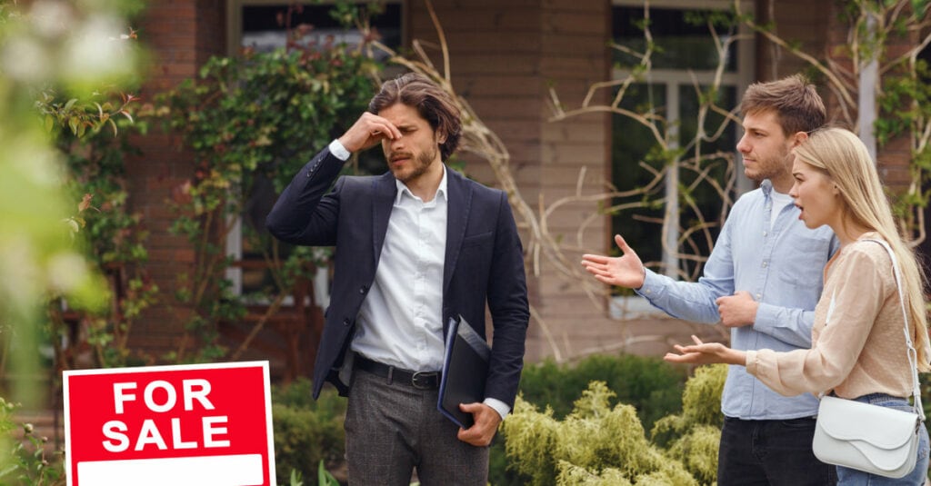 Troubled Real Estate Agent with upset clients about buying new home from property management